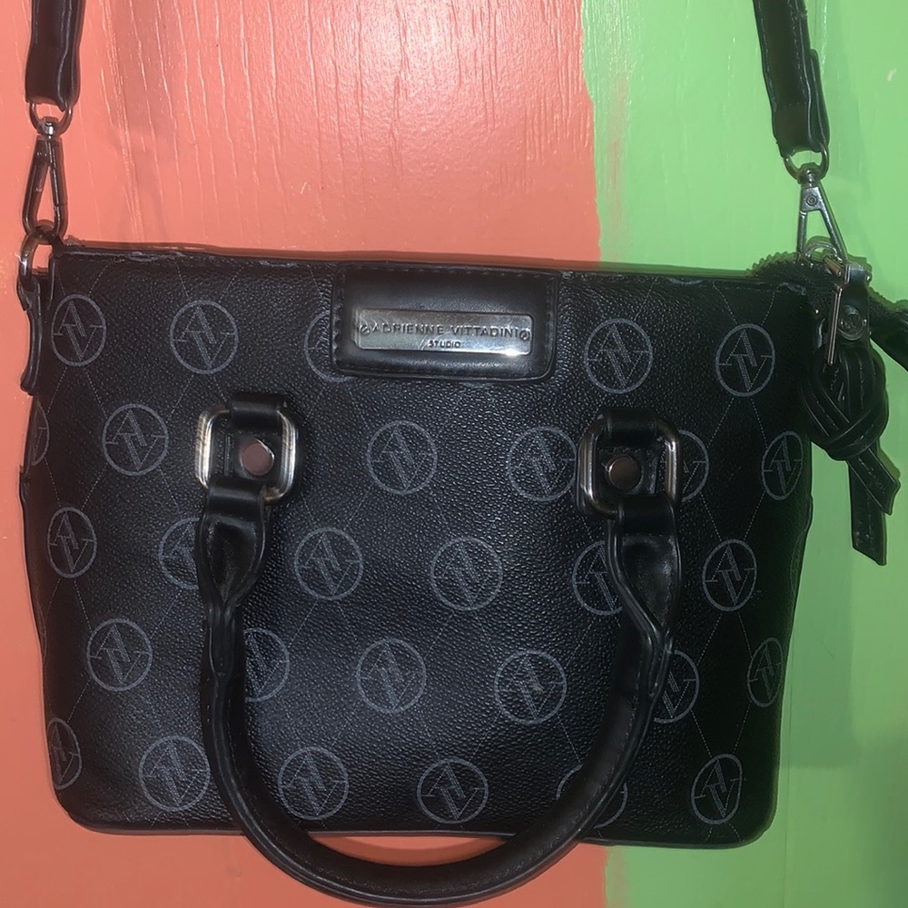 A purse a cup a picture frame and a candle melt waxer